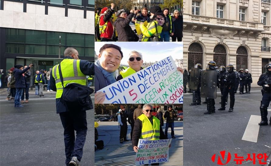노란조끼 시위 1주년을 맞아 프랑스 전역에서 시민들이 시위에 나섰다. 사진은 주말 노란조끼 시위에 나온 은퇴를 앞둔 철도공사 직원들과 함께 찍은 사진.(뉴시안/파리=옥승철 유럽연합통신원)